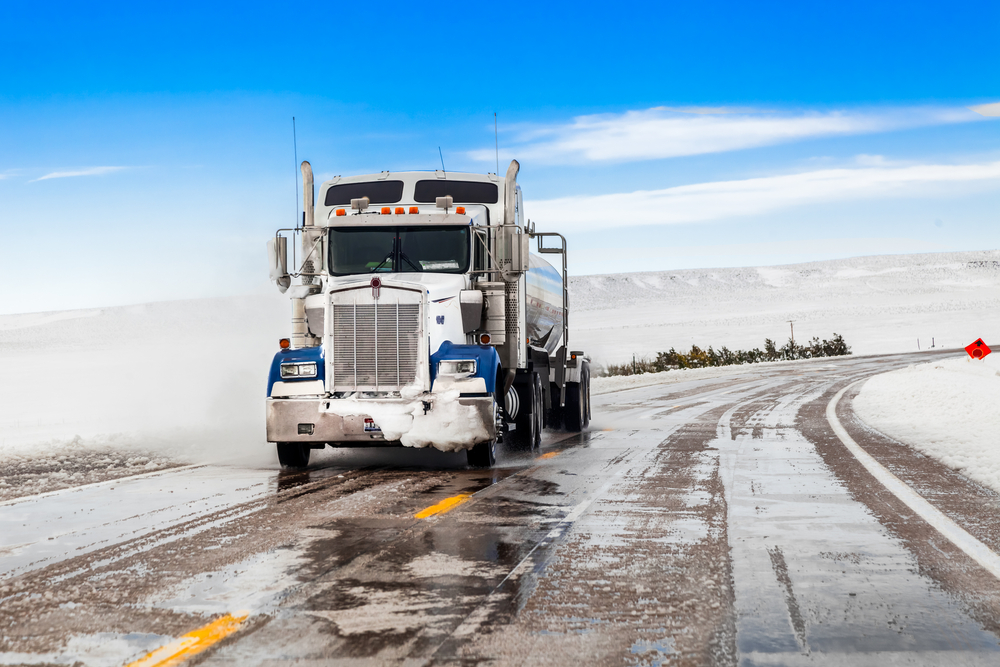 Truck driving in the snow